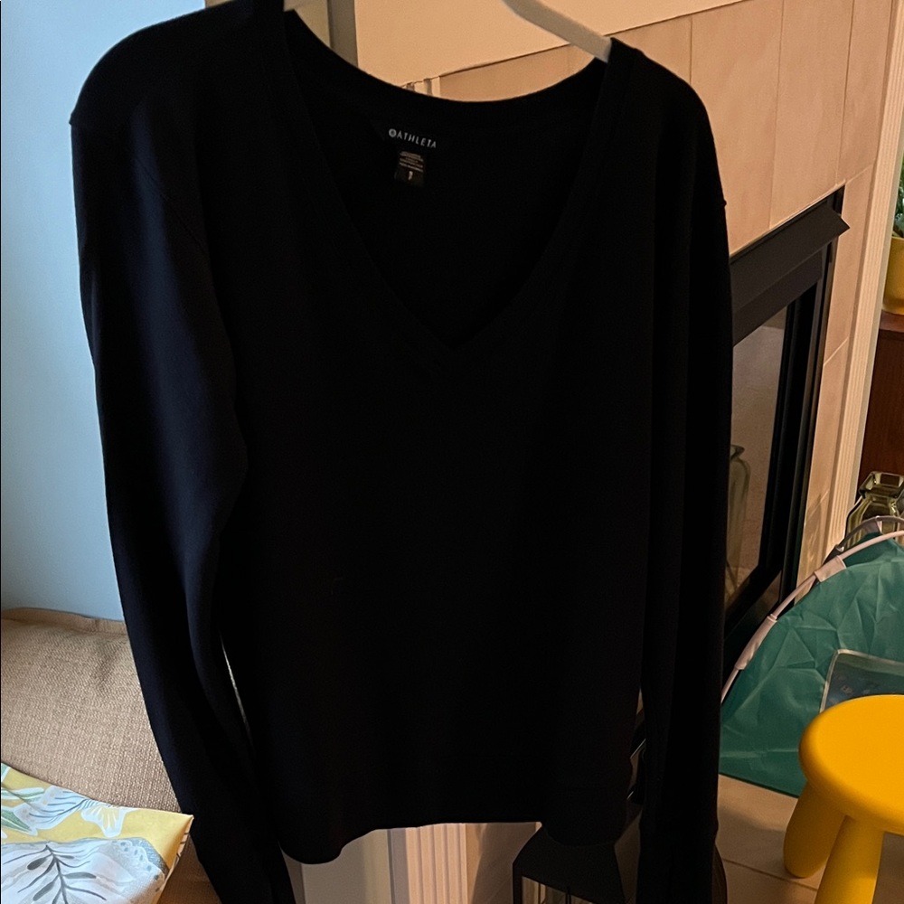 Athleta black v-neck pullover sweater.

Buy one item, second item is free